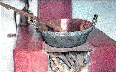 O tacho de cobre e a colher de pau