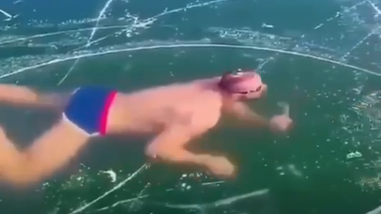 Homem fica desorientado debaixo de gelo e luta para encontrar saída; veja vídeo
