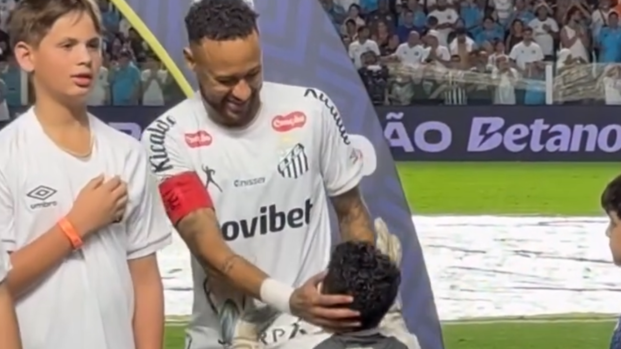 Fã mirim beija joelhos de Neymar e pede 'sorte' para Copa do Mundo. Veja vídeo