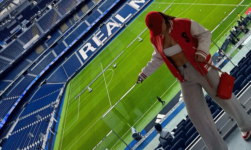 Bruna Pinheiro, suposta pivô do término de Virgínia e Vini Jr., publicou imagens no estádio do Real Madrid.
